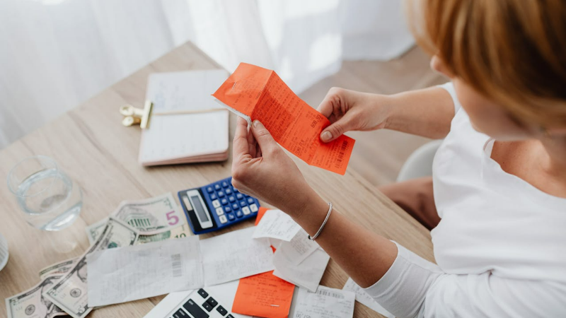 Woman checking medical bills.